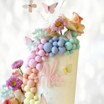 Торт лимонного цвета с бабочками TLCB013378 фото и оформление торта