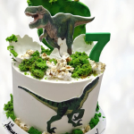 Торт парк динозавров с украшениями TPDU013715 фото и оформление торта